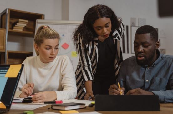 People collaborating on work
