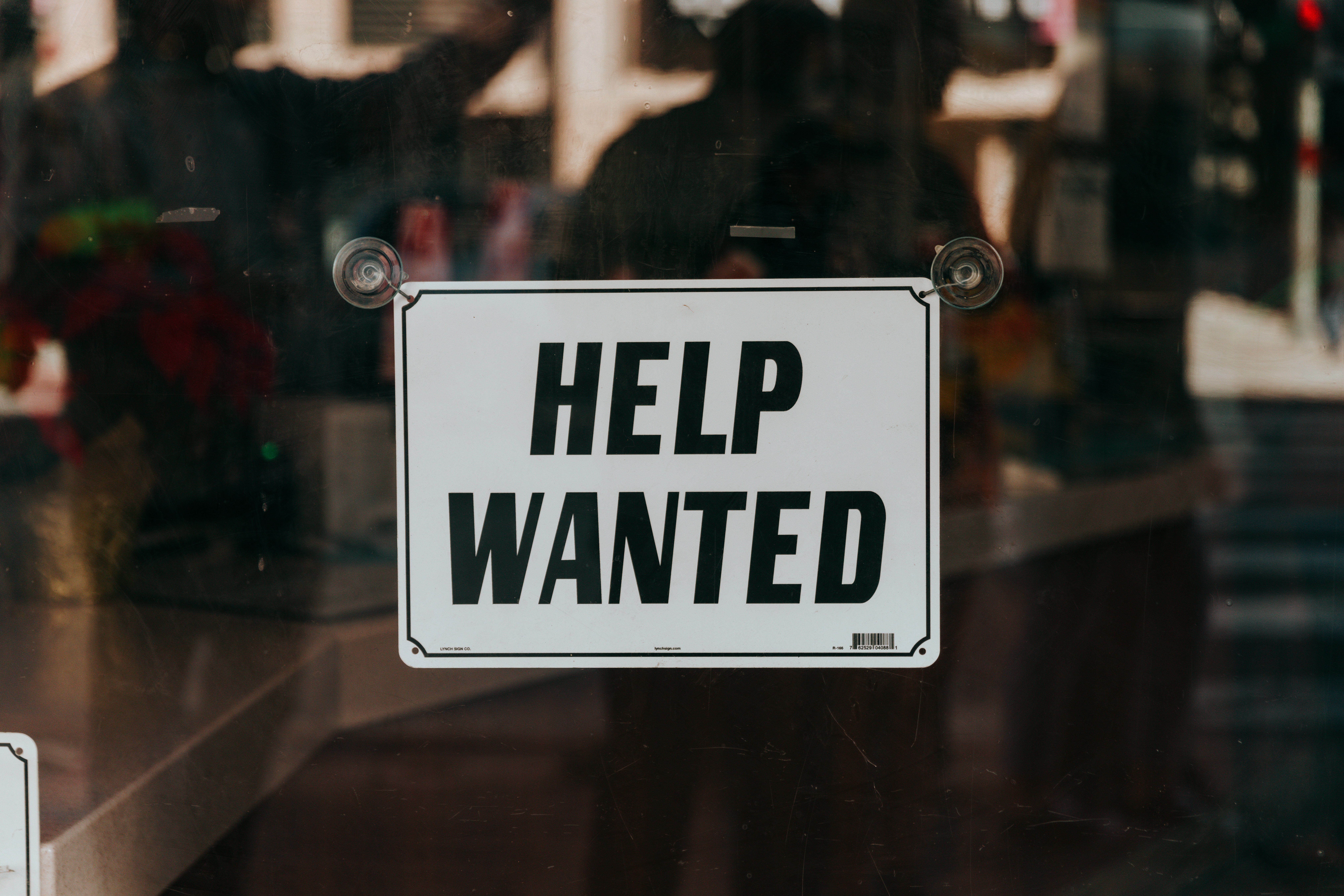 help wanted sign on window