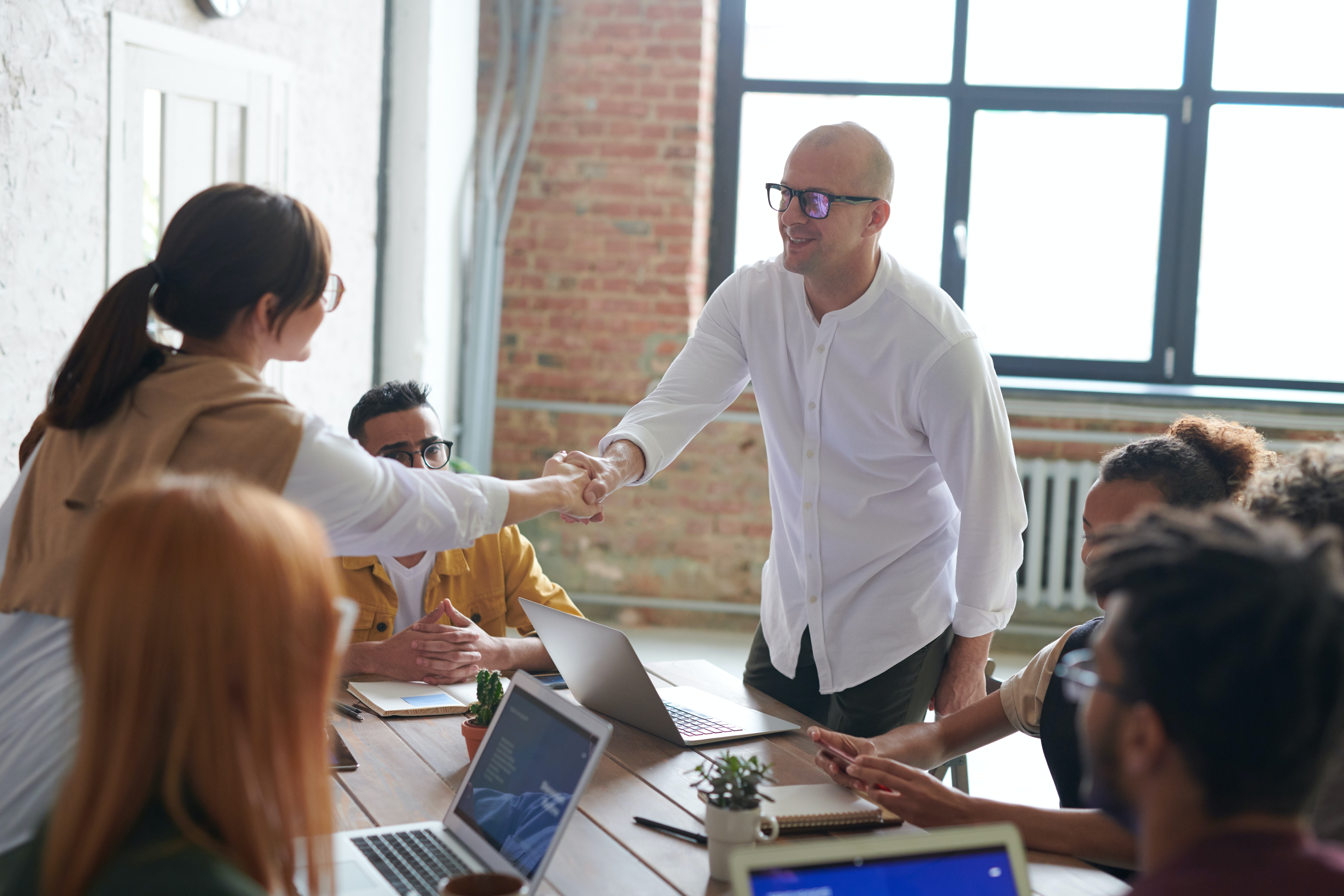 shaking hands at meeting