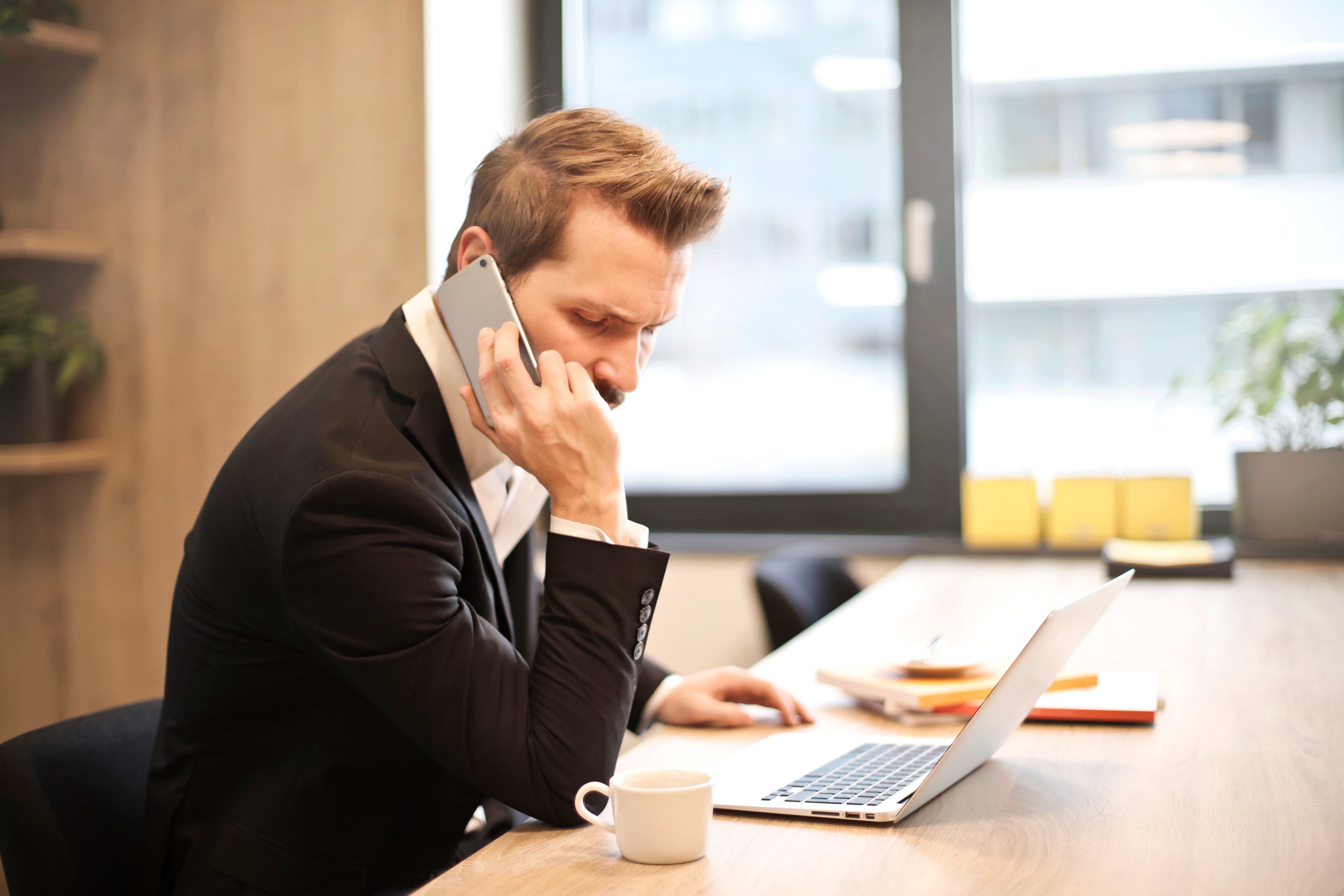 Man on the phone at work 